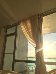 zon raam balkon zee